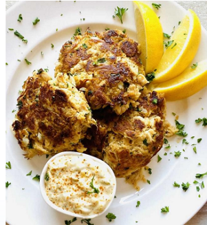 Pic of Lion's Mane Crab Cakes w/lemon wedges and tartar sauce