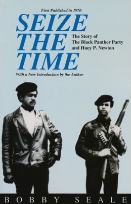 Seize the time book cover (PB Reprint): Bobby and Huey in leather jackets and berets, Huey holding rifle