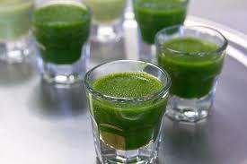 Pic of green superfood drink in shot glasses